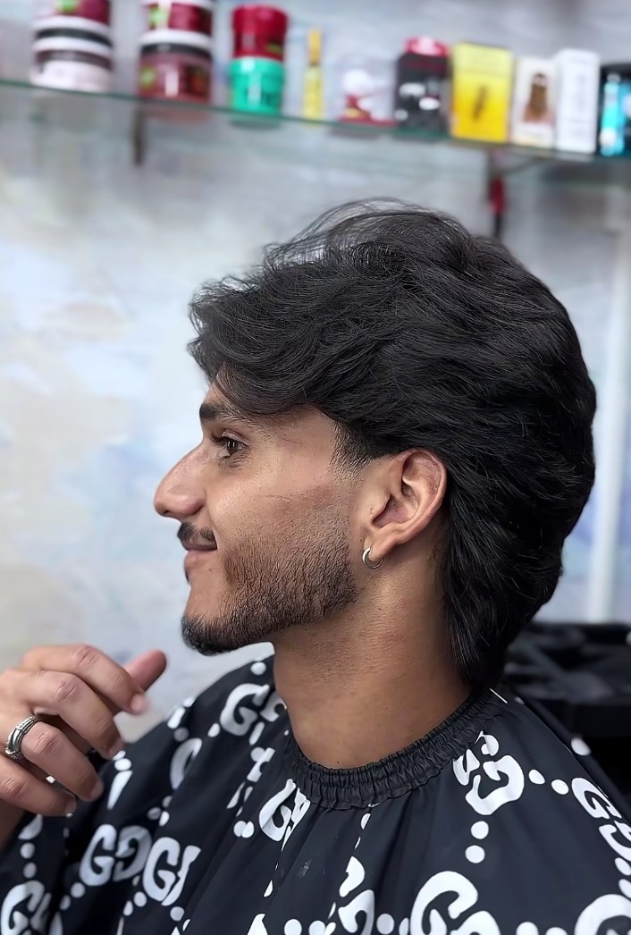 Men's long layered haircut at Hair Lounge