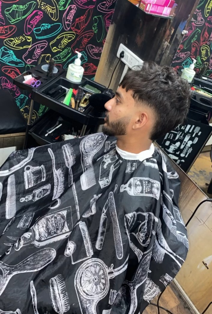 Men's fade and beard styling at Hair Lounge